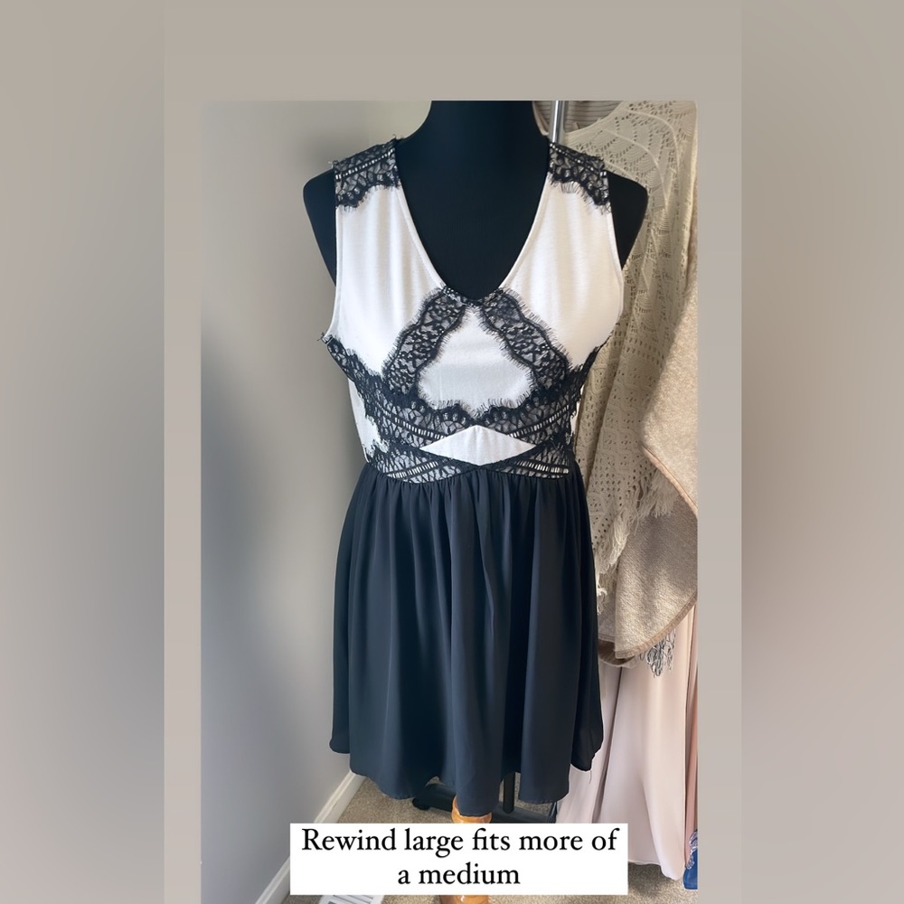 Cream and black sleeveless with lace detailing